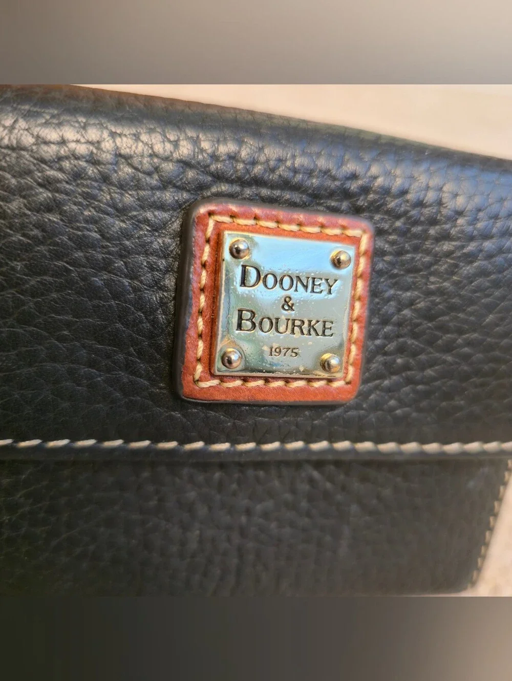 Dooney & Bourke Pebble Grain Leather Small Flap Wallet / Black / 4” x 4.5”